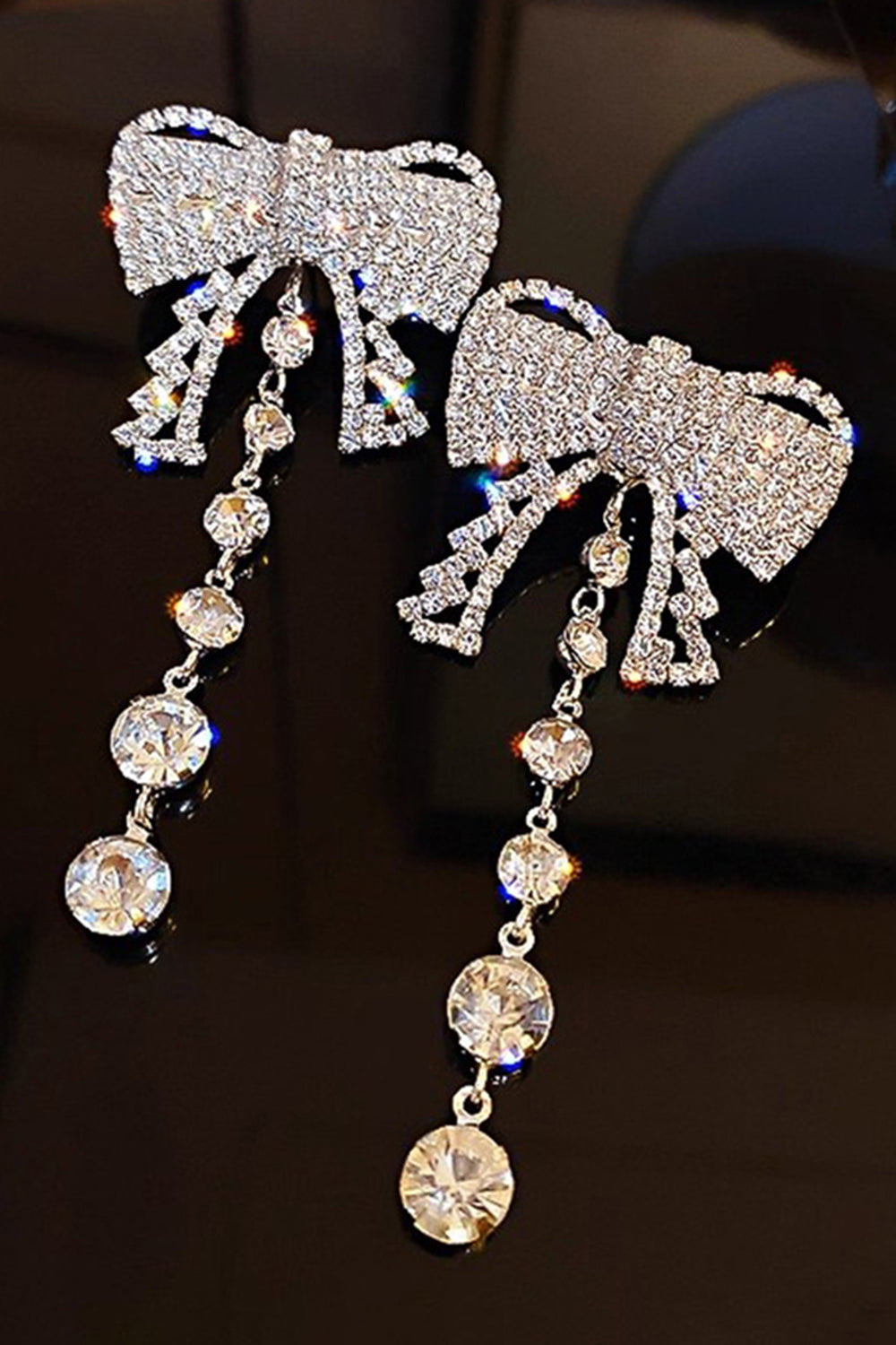 Sparkly Silver Bowed Dangle Earrings With Rhinestones - Image 2
